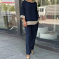 49%Reduction🔥 Elegant long-sleeved round-neck trouser set with straight legs.