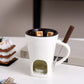🥳2026 HOT SALE🥳💞50K+ SOLD! 🍫🕯️ 50% OFF! Ceramic Chocolate Fondue Mug – tealight warming keeps chocolate & cheese melted, includes dipping fork. Fun for dates & Christmas gatherings! 🎄💚